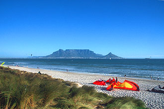 Bloubergstrand beach with Table Mountain and kite surfers