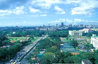 Manila skyline with Rizal Park and Intramuros