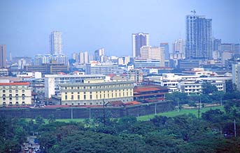 Manila skyline with Rizal Park and Intramuros detail