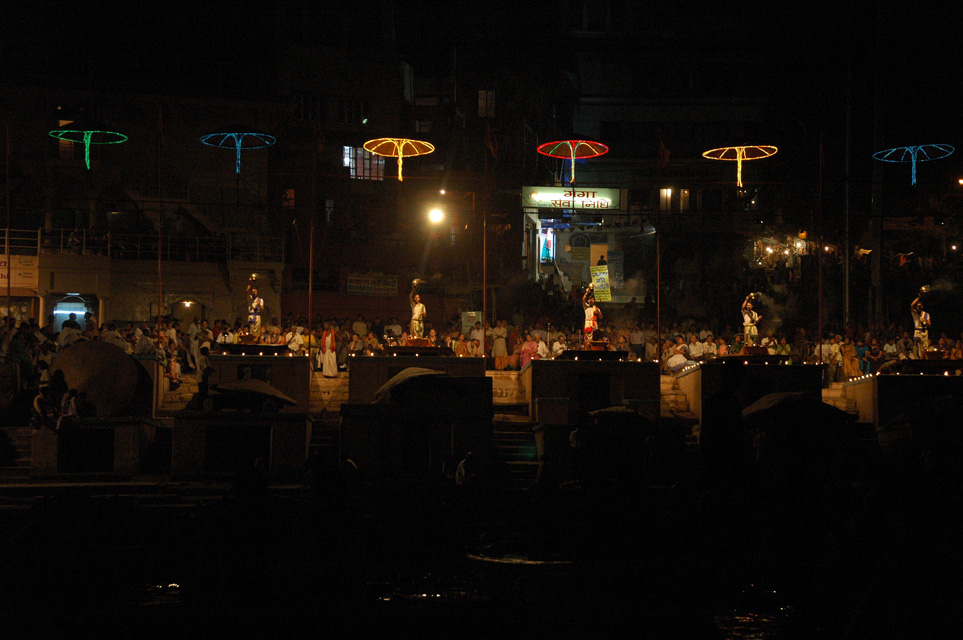 VNS Varanasi or Benares - Dasaswamedh Ghat Hindu priests performing a religious ceremony by night 3008x2000