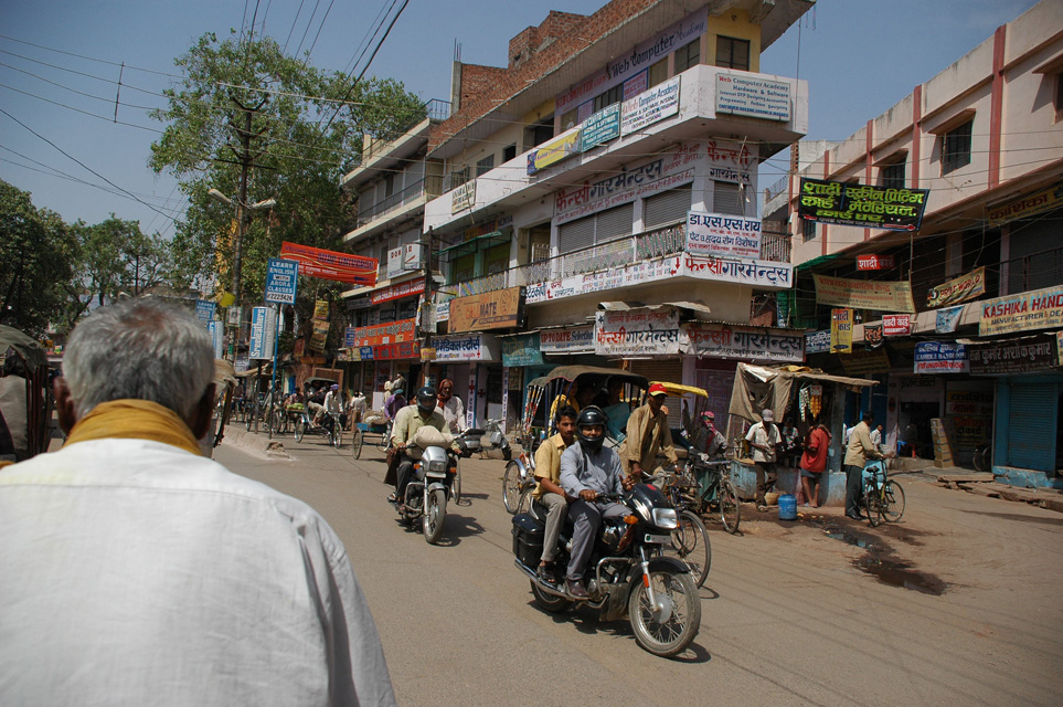 VNS Varanasi or Benares - houses and motorbikes in the city center seen from a cycle-rickshaw 3008x2000