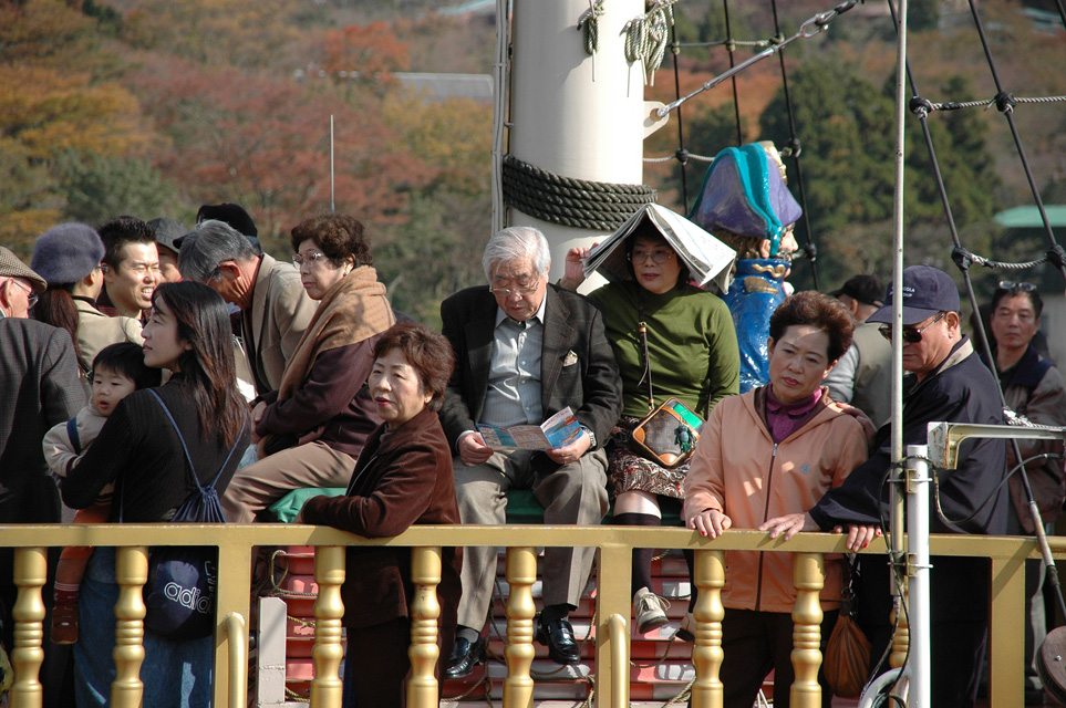 NRT Hakone - pirate ship ferry in Togendai harbour on Ashino-ko lake japanese people on upper deck 3008x2000