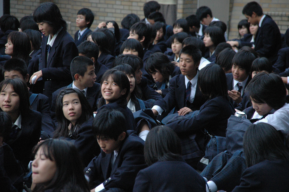 KIX Kyoto - Kyoto station school kids sitting on the floor outside the terminal building 3008x2000