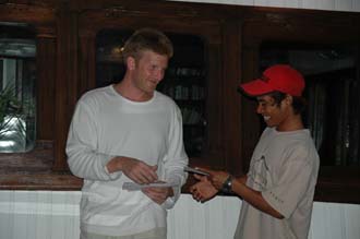 AMI Lombok Ombak Putih sailing ship captains dinner Martin handing out the tips 6 3008x2000