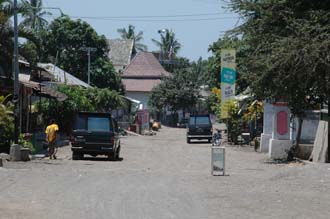 AMI Lombok Pringgasela traditional weaving village main street with donation box 3008x2000