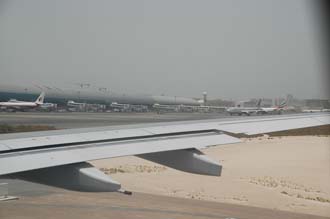 DXB Dubai International Airport - Terminal 1 with aircrafts on the gates 3008x2000