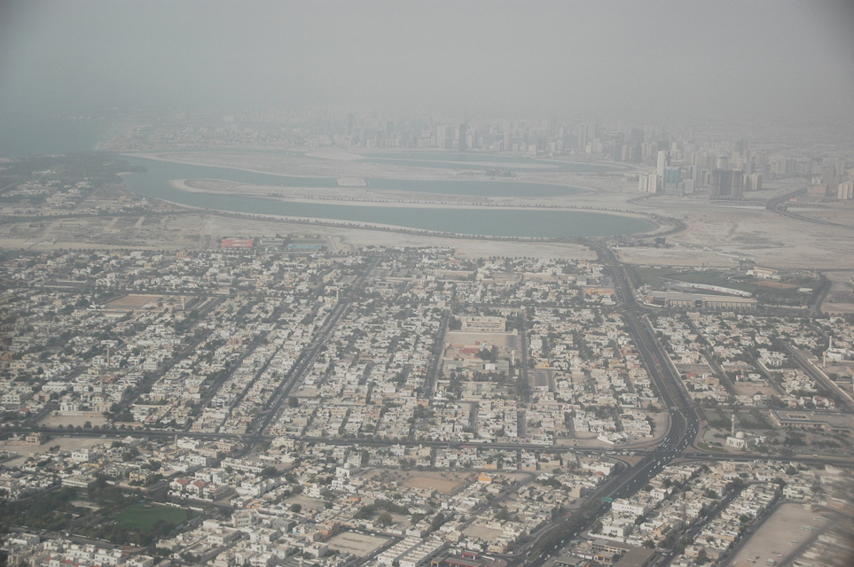 DXB Dubai from aircraft - Al Mamzar residential area and beach with Sharjah in the background 01 3008x2000